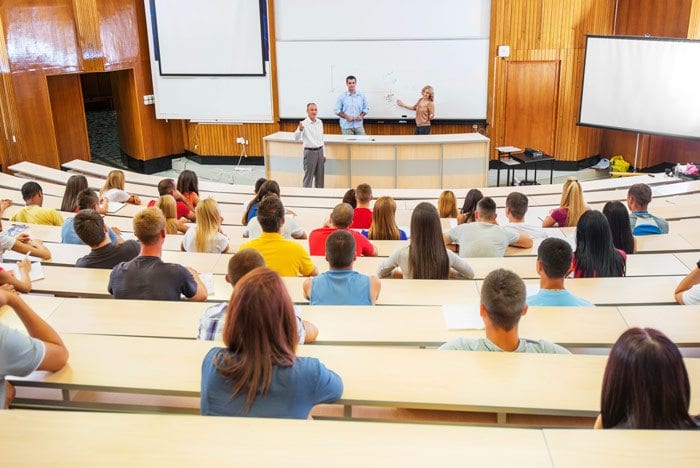 Students learning about a medical topic in a lecture hall