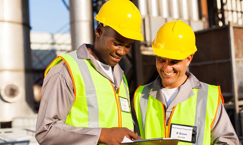 Oil and gas workers talking