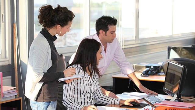 People working at a desk